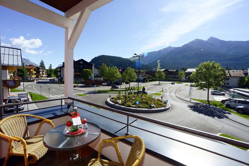 room with a balcony in the Das Hotel Eden Seefeld 