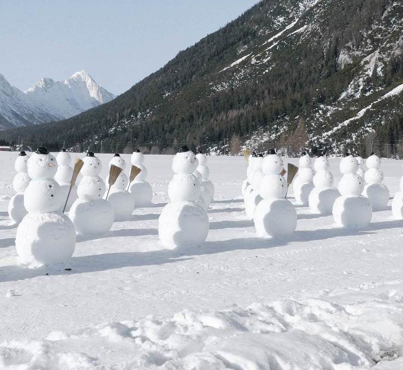 Snowman in the Mountains